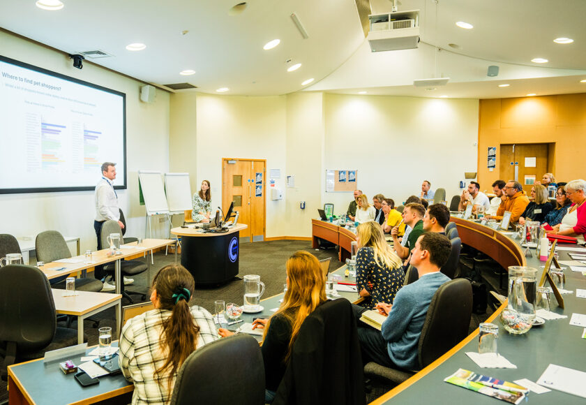 Megan Niven from CACI delivering a presentation at the 2024 Business of Pets conference at Cranfield Management Development Centre