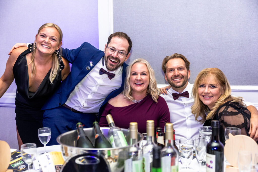A table of 2025 PIF Award finalists enjoying the night after the awards ceremony