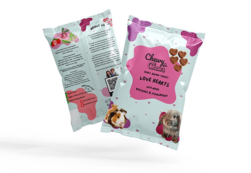A bag of ChewyChewsUK Beetroot and Strawberry Love Hearts hay-based treats for rabbits and guinea pigs.